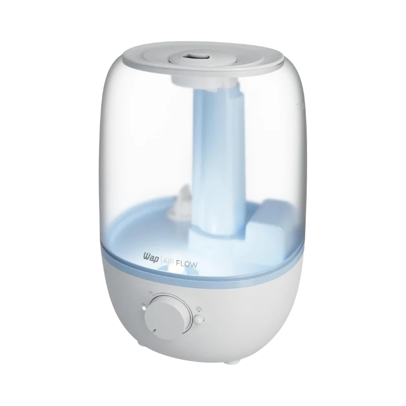 Umidificador de ar compacto WAP AIR FLOW U2 posicionado ao lado de um computador em mesa de escritório. Confira hoje